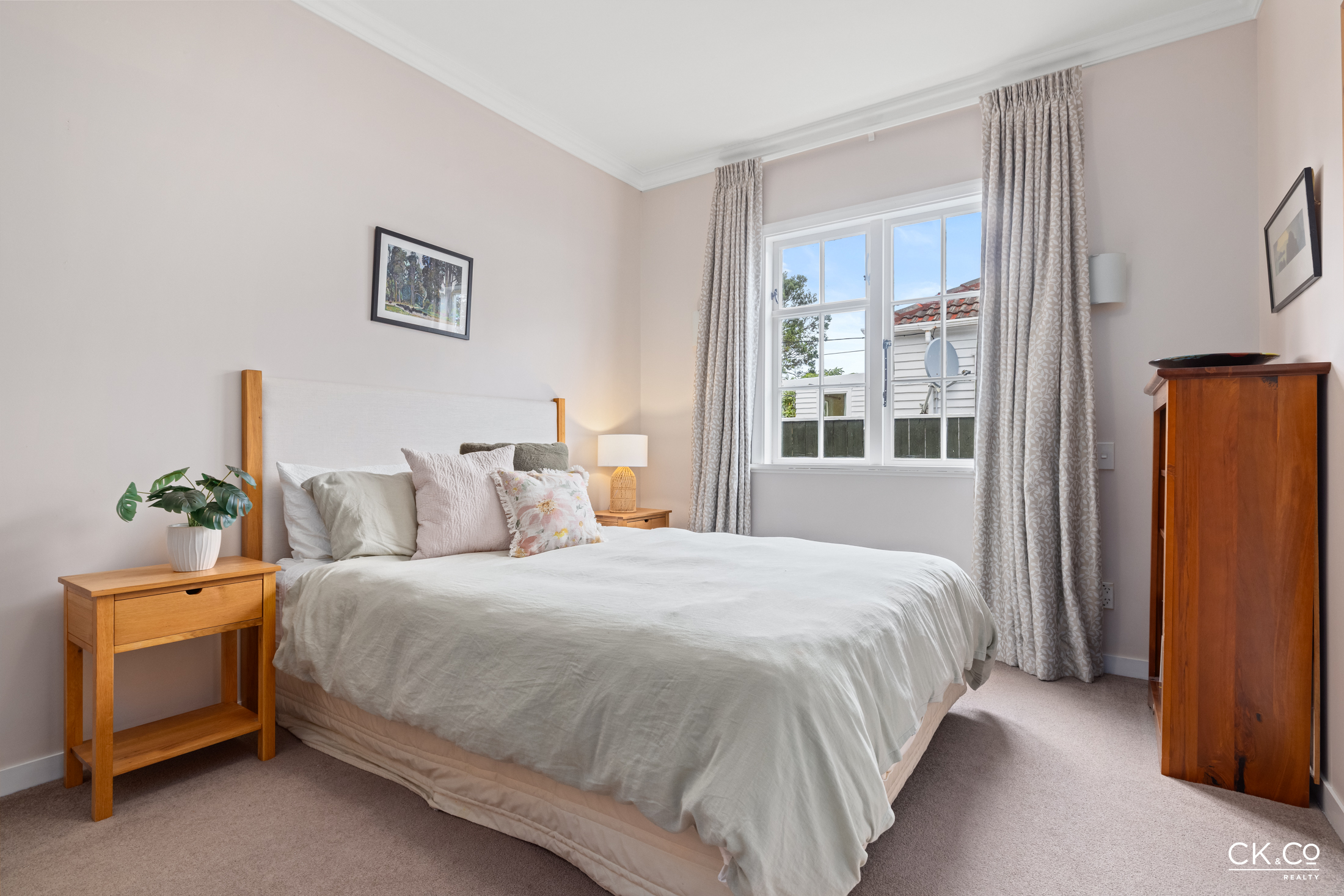 Light-filled bedroom with neutral tones